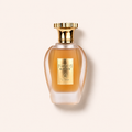 Matný jantarový flakon Emir Voux Elegante EDP se zlatým uzávěrem na světlém pozadí – MrRizz