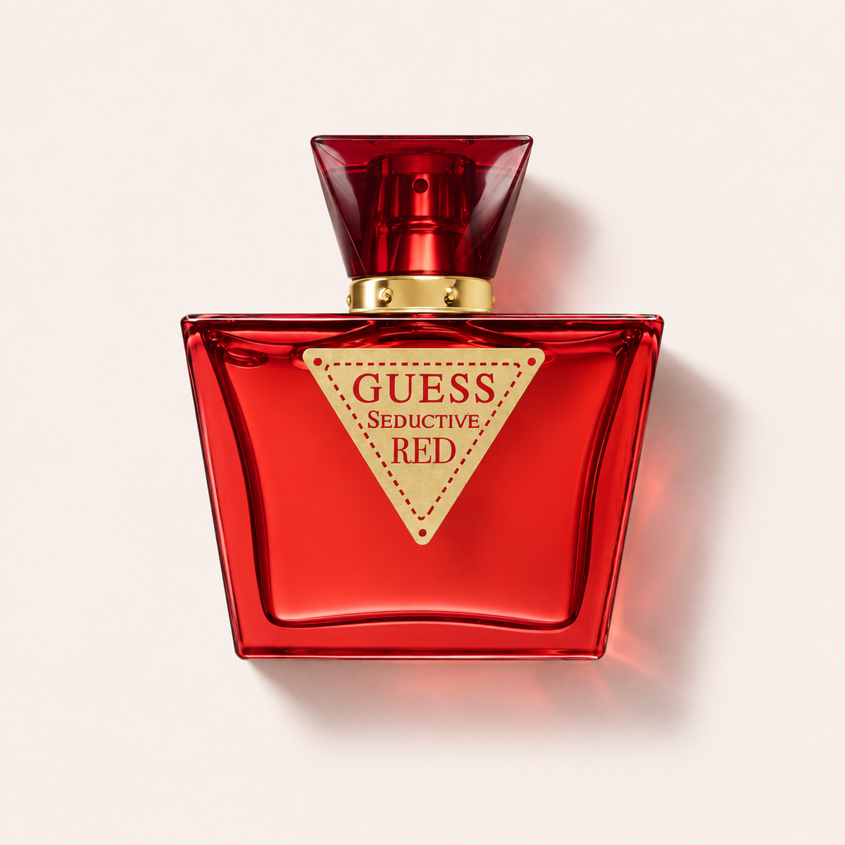 GUESS Seductive Red EDT 75 ml, červený dámský flakon položený na zádech – MrRizz