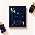 Parfemovy obraz Ex Nihilo Blue Talisman Extrait de Parfum v cernem ramu - ilustracni fotografie