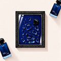 Parfemovy obraz BDK Parfums Silver Ceremony v cernem ramu - ilustracni fotografie