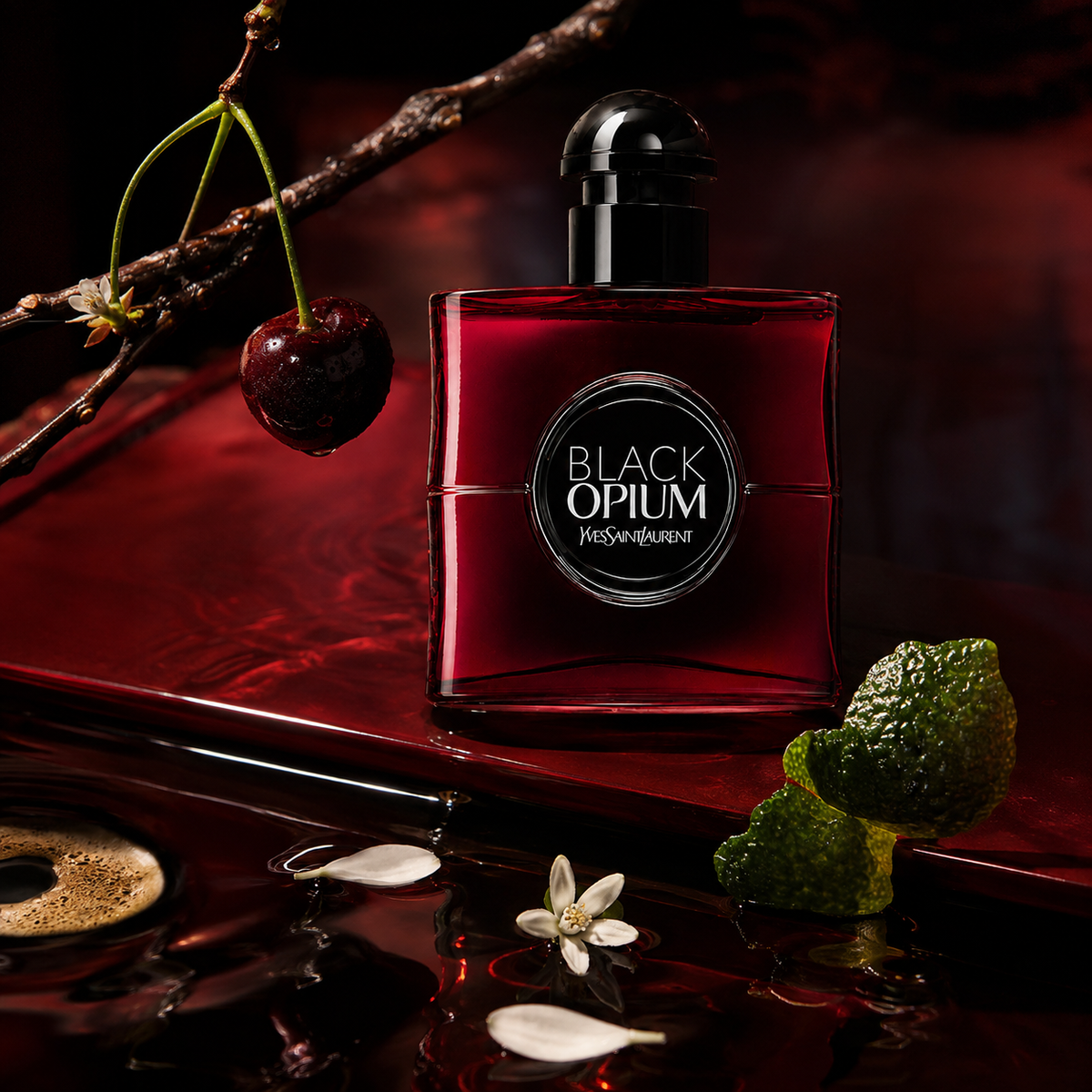 YSL Black Opium Over Red v červeném zátiší s třešní, kávou a bílými květy – MrRizz